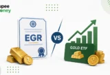 Illustration comparing Electronic Gold Receipts (EGR) and Gold ETFs, featuring gold bars, rupee coins, a Gold ETF card, growth chart, and the RupeeMoney logo, explaining the differences between EGR and Gold ETF investment options in India.