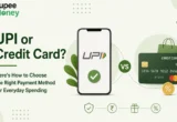 UPI or Credit Card comparison illustration featuring a smartphone with UPI payment, credit card, cashback percentage icon, shopping bag, security shield, and the RupeeMoney logo, helping users choose the best payment method for everyday spending in India.