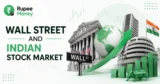 Wall Street and Indian Stock Market infographic featuring Wall Street, Indian stock market buildings, US and Indian flags, global finance imagery, rising market charts, and Rupee Money branding.