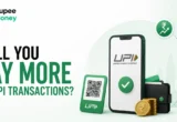 Will You Pay More on UPI Transactions banner featuring a UPI payment smartphone, QR code, digital wallet, rupee coins, and payment-related financial icons.