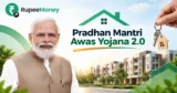 Pradhan Mantri Awas Yojana 2.0 banner featuring Prime Minister Narendra Modi, affordable housing, modern residential buildings, house keys, a home icon, and RupeeMoney branding.