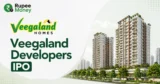 Veegaland Developers IPO banner featuring the Veegaland Homes logo, modern residential buildings, landscaped property development, and RupeeMoney branding.